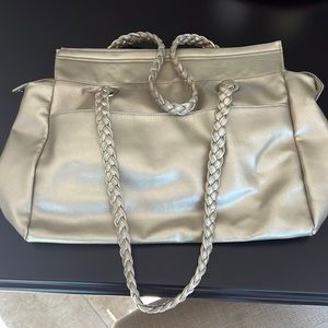 Gold Lancôme purse